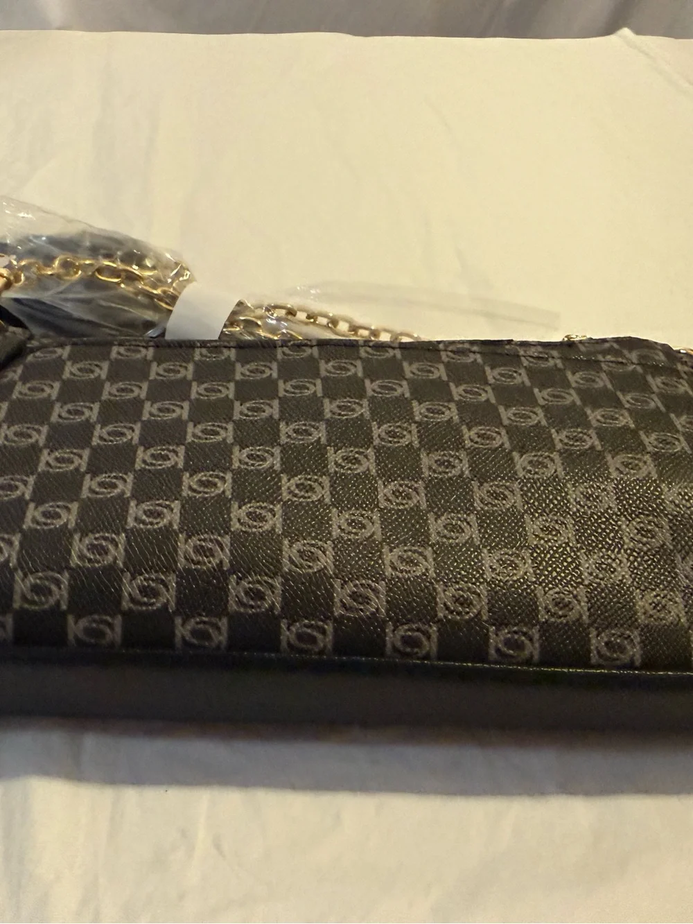 bebe Black and Gray Logo Wristlet with Gold Chain